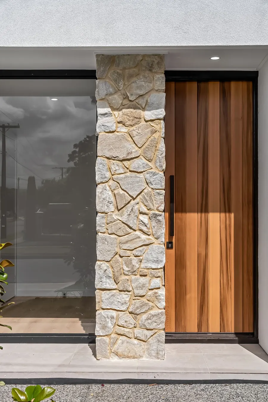 Stone and timber entrance detail of a modern Adelaide new-build home